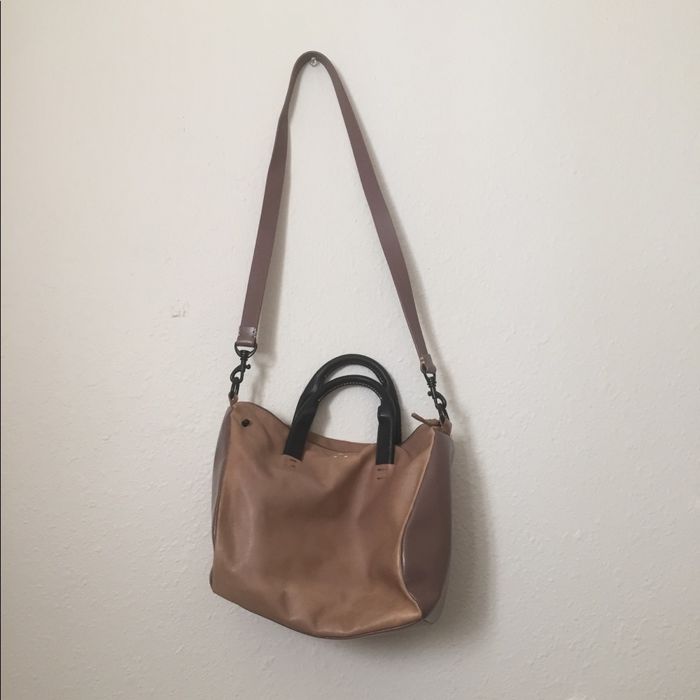 Tan and black cross body bag